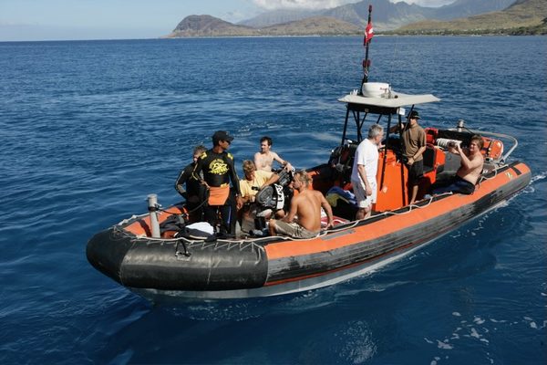 Camera crew aboard RIB support boat, Oahu, Hawaii
