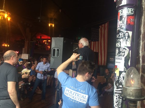 Crew filming a commercial as Bernie Sanders speaks at a rally venue, Seattle