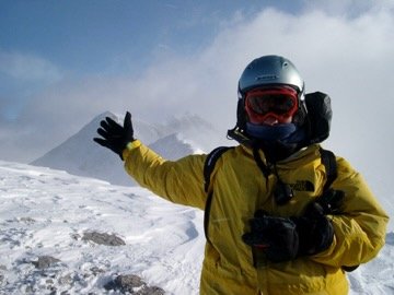Portrait on a snowy mountain summit, Banff, Canada