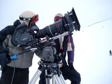 Camera crew filming on a snowy mountainside, Banff, Canada