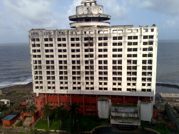 Bombed-out oceanfront hotel, Cuba