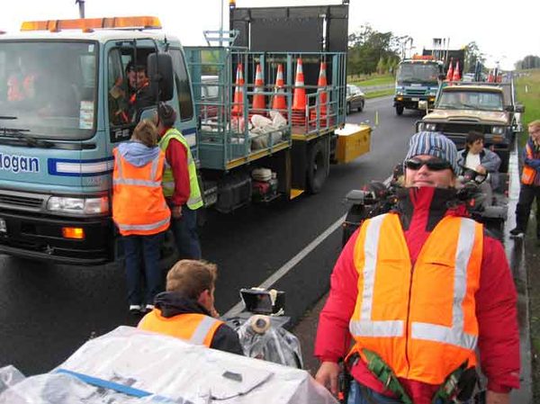 Camera car and safety crew on a highway shoot, Auckland, New Zealand