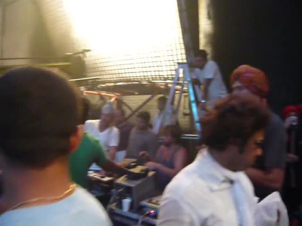 Night event, crowd dancing under laser lights, India