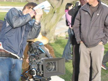 Crew filming outdoors in park, Los Angeles