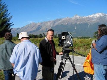 Crew with mountain backdrop, New Zealand
