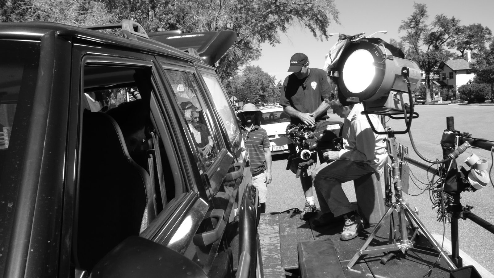 Crew setting up lighting for street scene, Colorado