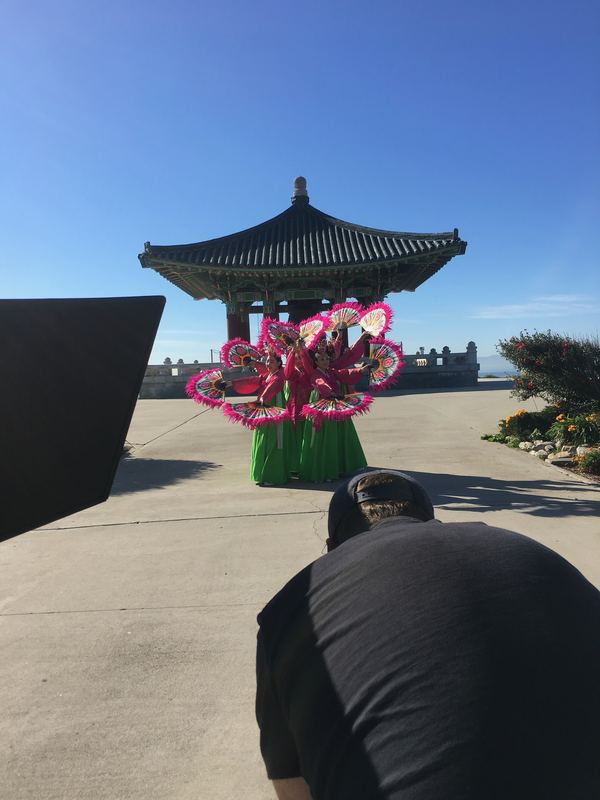 Korean fan dancers on location with pagoda backdrop, Los Angeles