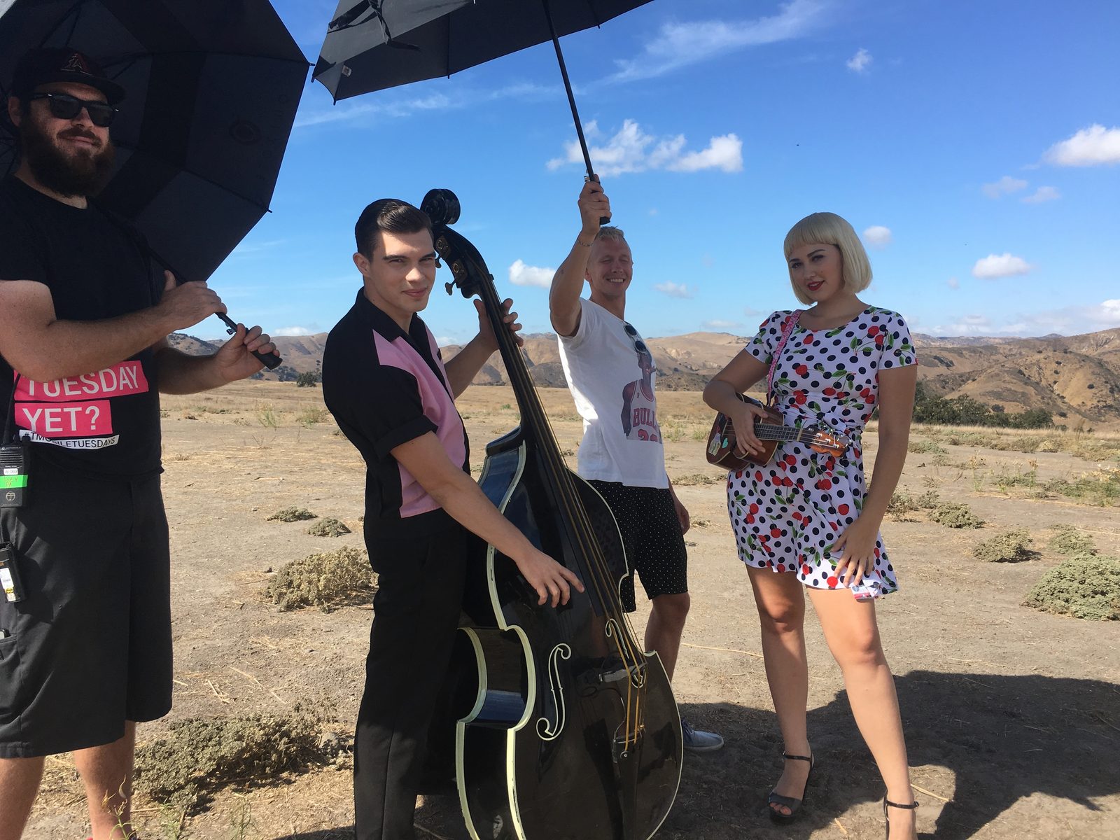 Rockabilly-styled musicians on desert location, Los Angeles